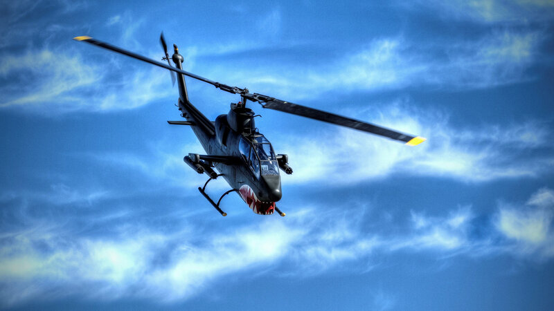 Military Helicopter in Flight — Blue, Dramatic, Photograph