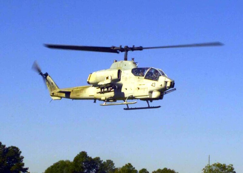 Military Helicopter in Flight — Blue, Neutral, Afternoon, Photograph, Trees