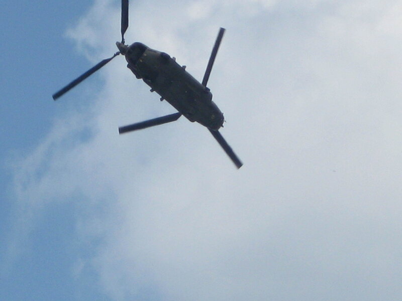 Military Helicopter in Flight — Blue, Neutral, Photograph