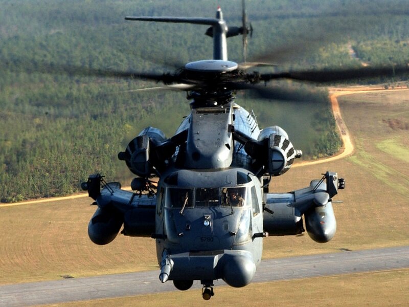 Military Helicopter in Flight — Gray, Dramatic, Afternoon, Photograph, Forest