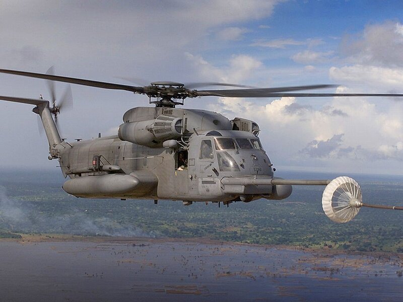 Military Helicopter in Flight — Gray, Dramatic, Afternoon, Photograph, Parachute, Land