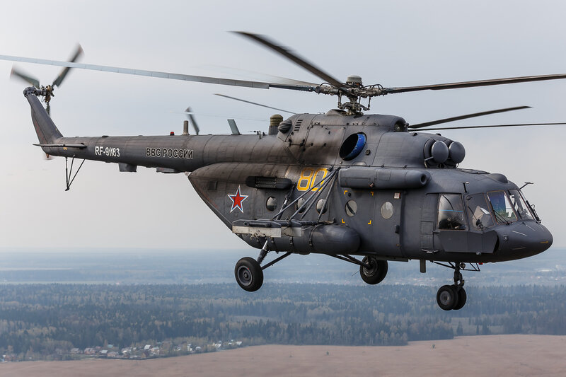 Military Helicopter in Flight — Gray, Dramatic, Photograph, Forest