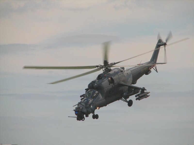 Military Helicopter in Flight — Gray, Dramatic, Photograph, Rotors