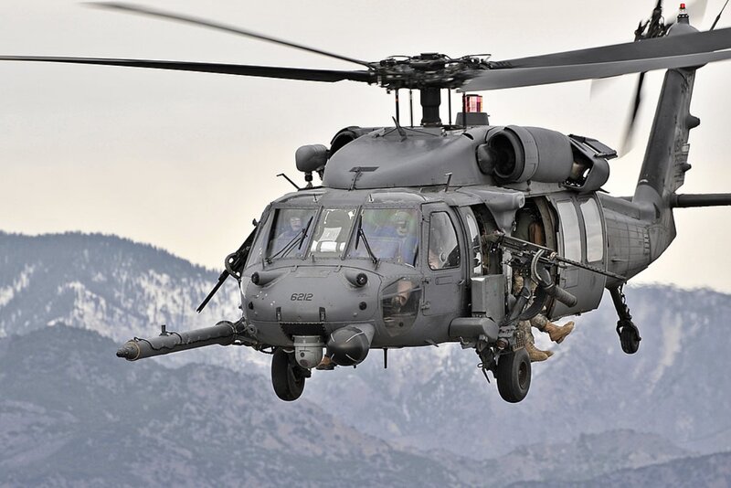 Military Helicopter in Flight — Gray, Dramatic, Photograph, Soldiers