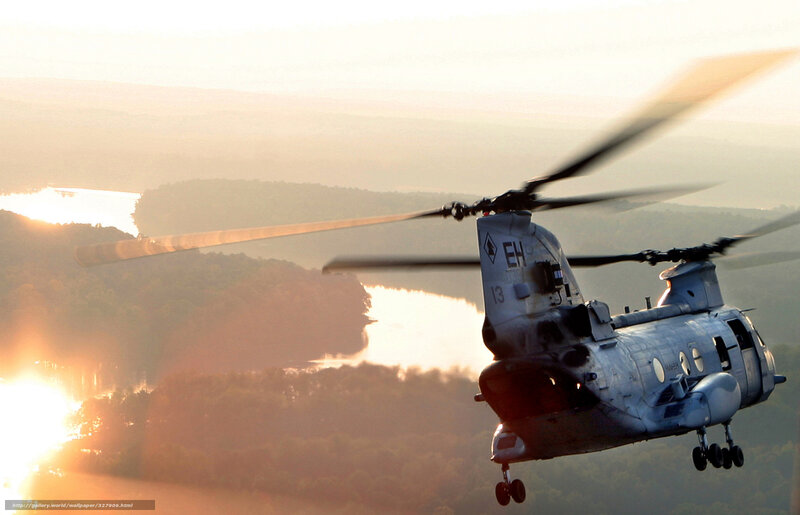 Military Helicopter in Flight — Gray, Dramatic, Sunrise