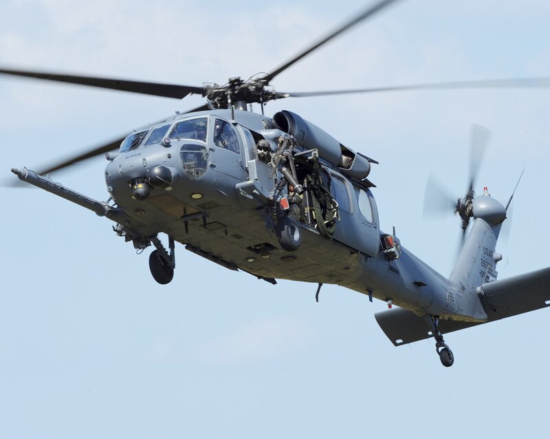 Military Helicopter in Flight — Gray, Dynamic, Afternoon, Photograph, Rotor Blades, Sky