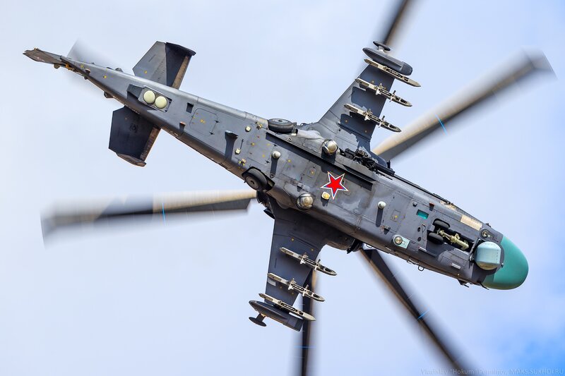 Military Helicopter in Flight — Gray, Dynamic, Afternoon, Photograph, Rotor Blades