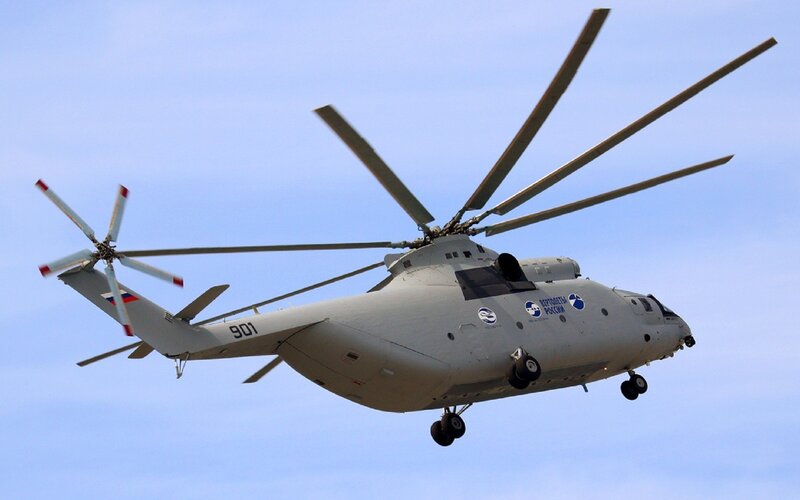 Military Helicopter in Flight — Gray, Neutral, Afternoon, Photograph, Sky, Wheels