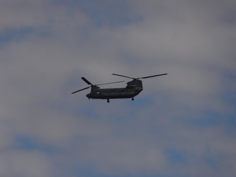 Military Helicopter in Flight — Gray, Overcast, Photograph