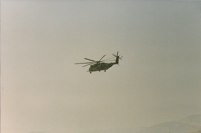Military Helicopter in Flight — Gray, Overcast