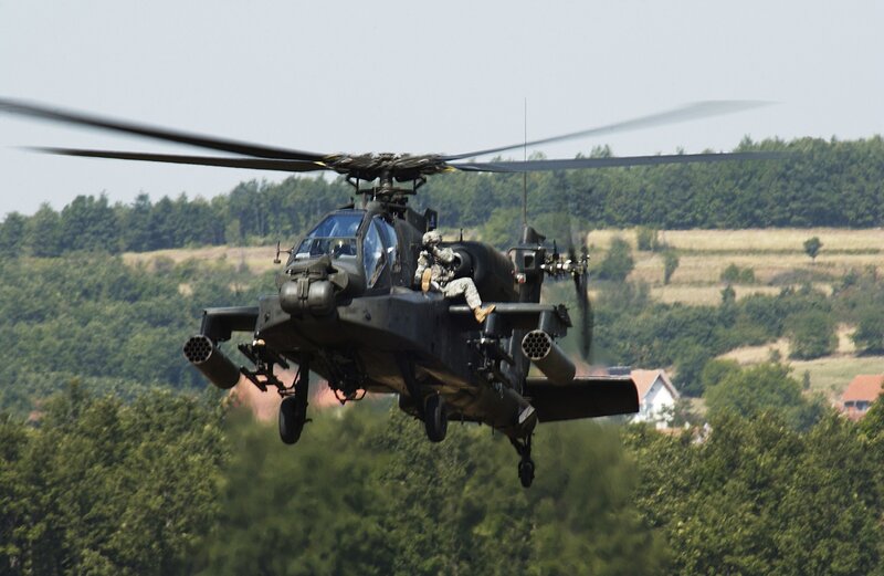 Military Helicopter in Flight — Green, Active, Afternoon, Photograph, Soldier, Trees, Hills, Gray