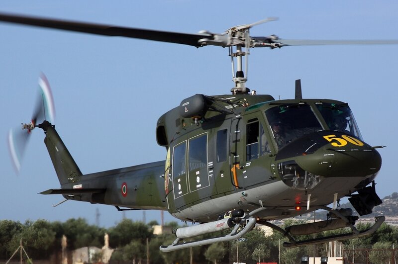 Military Helicopter in Flight — Green, Active, Afternoon