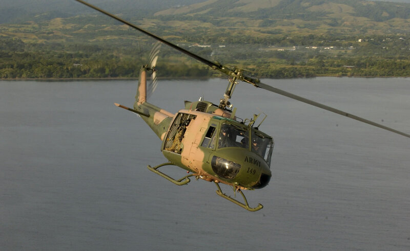 Military Helicopter in Flight — Green, Calm, Afternoon, Photograph, River