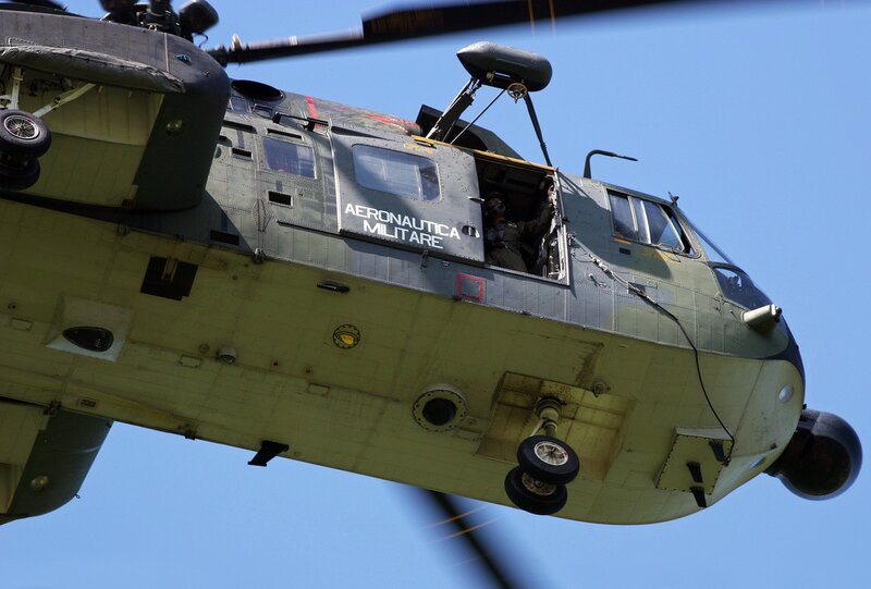 Military Helicopter in Flight — Green, Clear, Afternoon, Photograph
