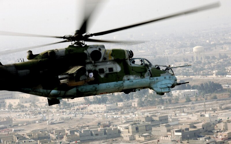 Military Helicopter in Flight — Green, Dramatic, Afternoon, Photograph, Cityscape