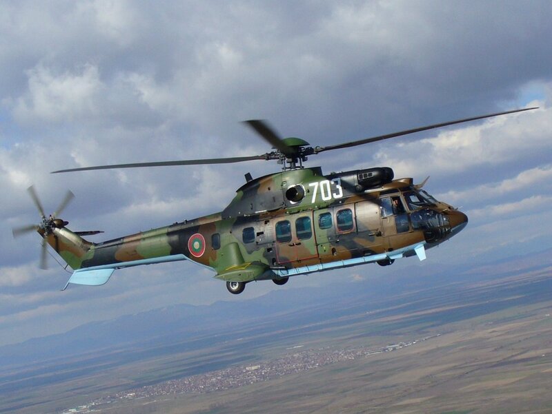 Military Helicopter in Flight — Green, Dramatic, Afternoon, Photograph, Clouds