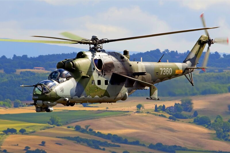 Military Helicopter in Flight — Green, Dynamic, Afternoon, Photograph, Aircraft