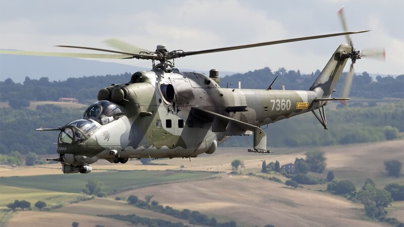 Military Helicopter in Flight — Green, Dynamic, Afternoon, Photograph, Countryside, Hills