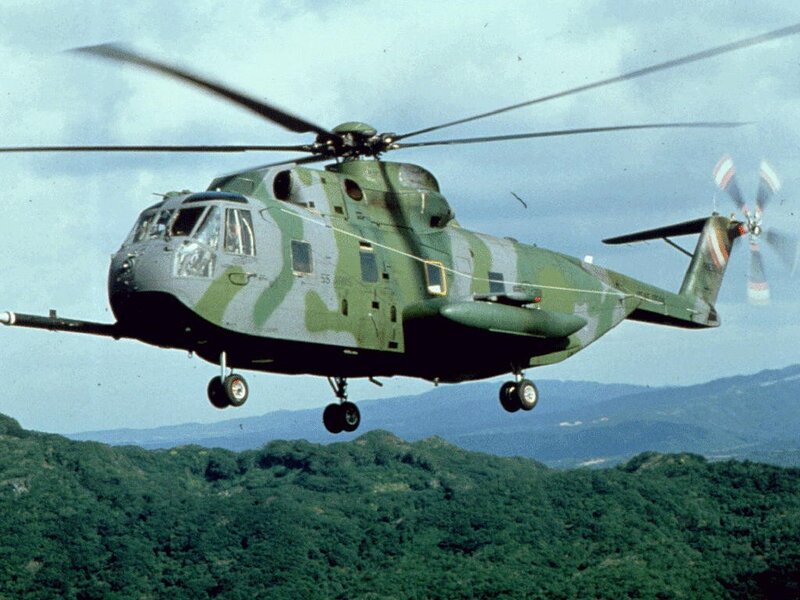 Military Helicopter in Flight — Green, Dynamic, Afternoon, Photograph, Mountains, Sky