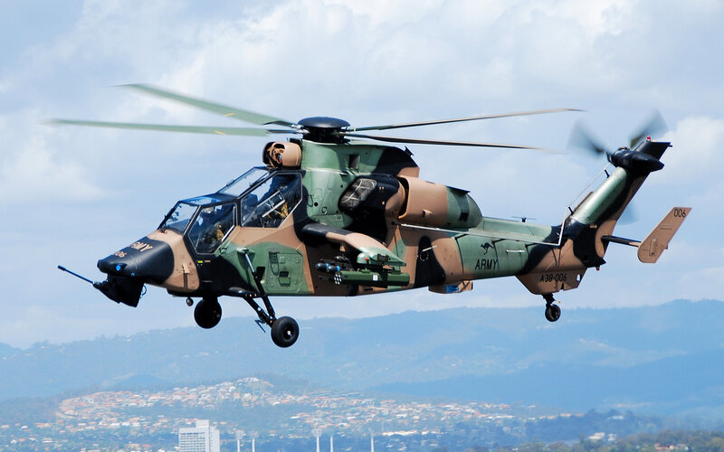 Military Helicopter in Flight — Green, Dynamic, Afternoon, Photograph