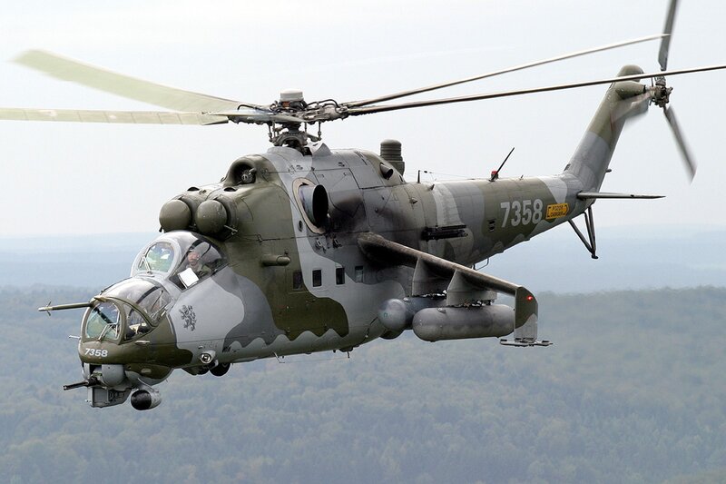 Military Helicopter in Flight — Green, Dynamic, Photograph, Forest