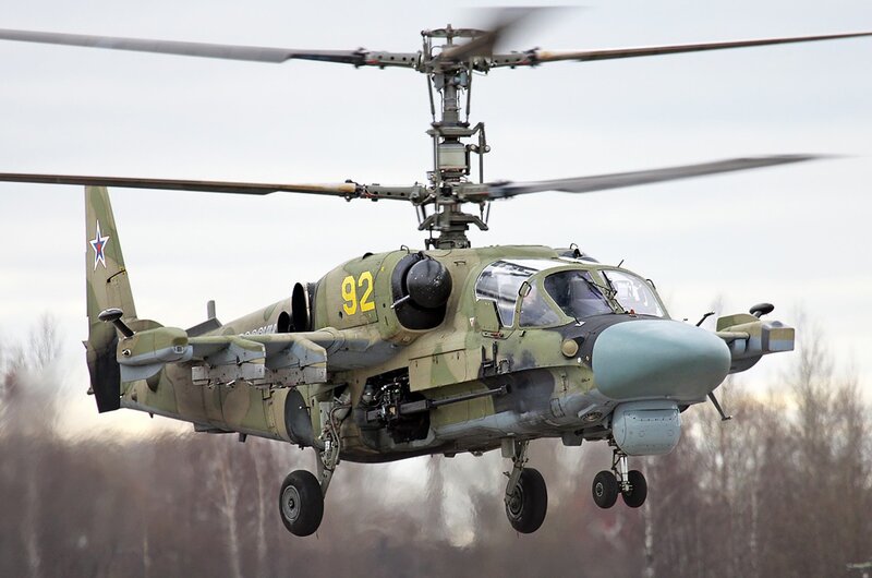 Military Helicopter in Flight — Green, Dynamic, Winter