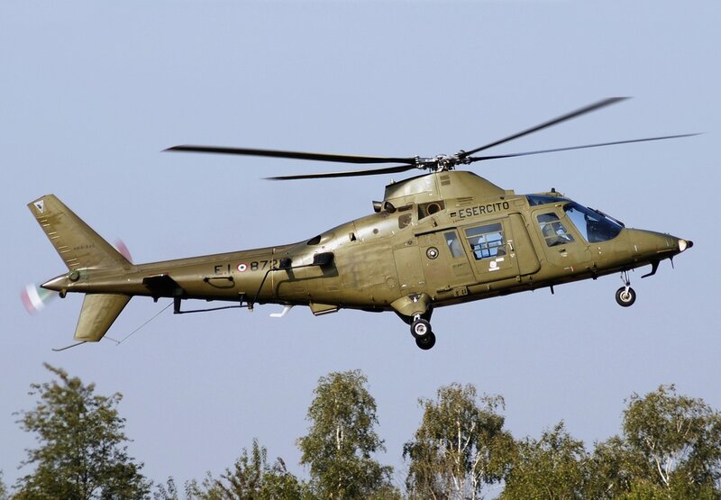 Military Helicopter in Flight — Green, Neutral, Afternoon, Photograph, Trees, Sky