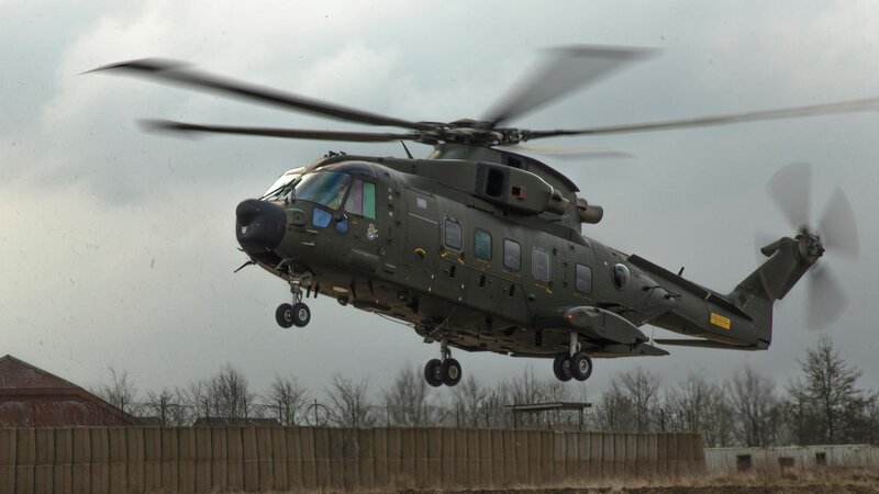 Military Helicopter in Flight — Green, Overcast, Photograph, Fence