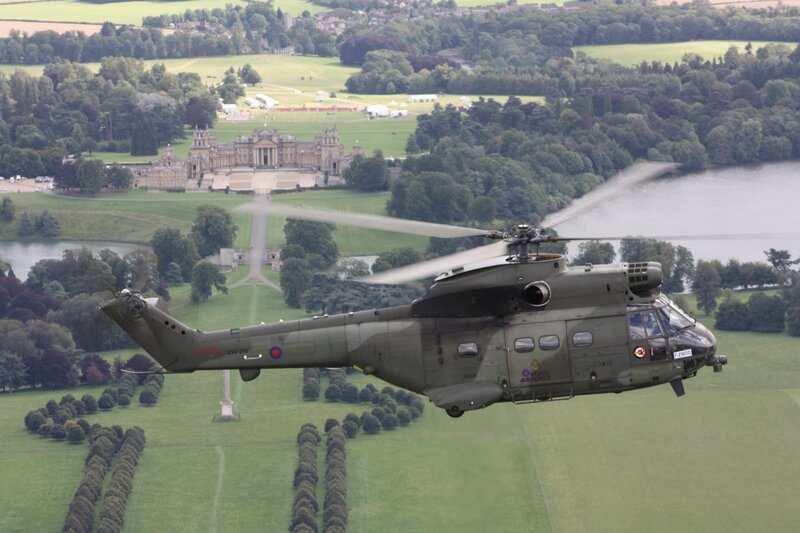 Military Helicopter in Flight — Green, Serene