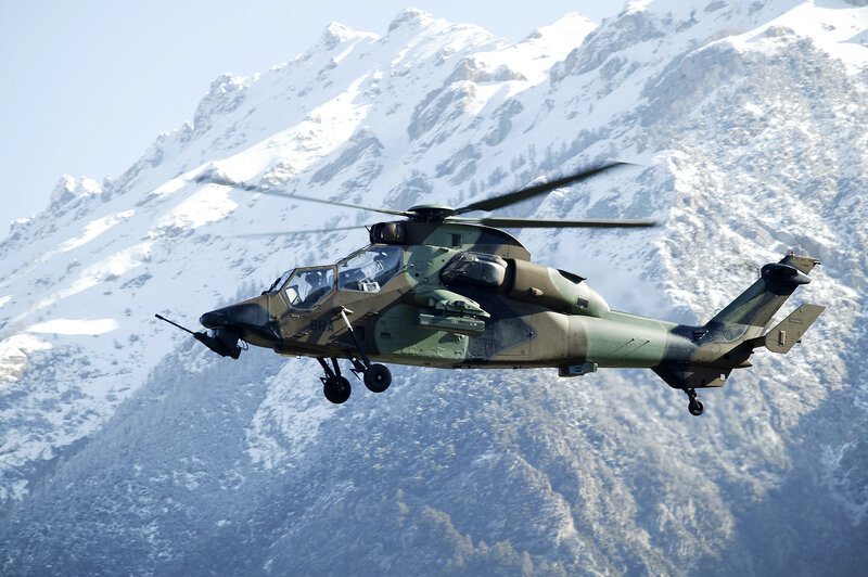 Military helicopter in mountain flight