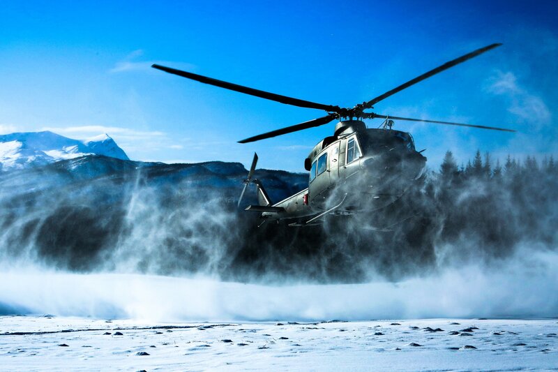 Military Helicopter in Snow — Blue