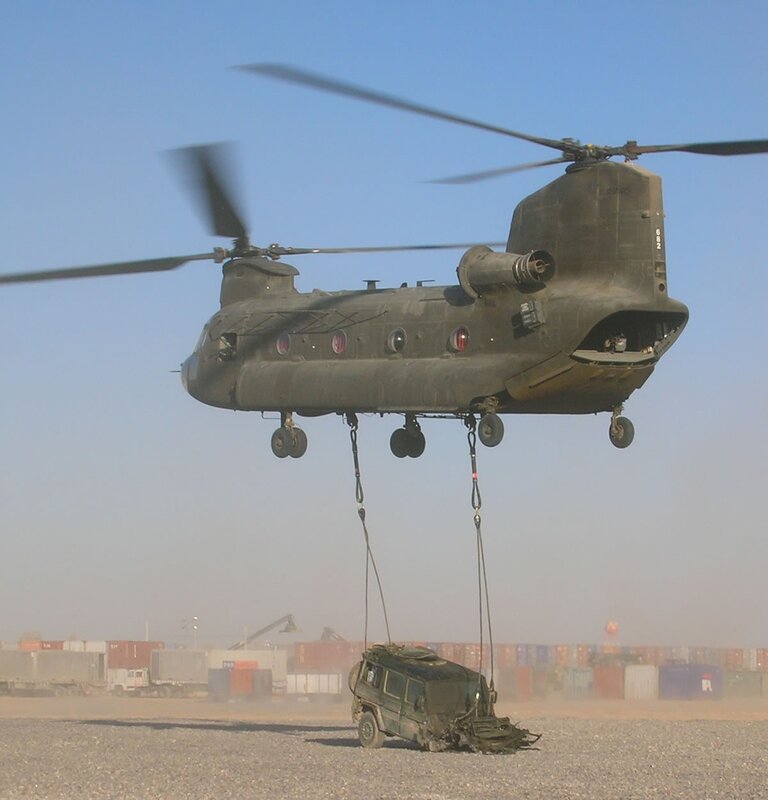 Military helicopter lifting vehicle