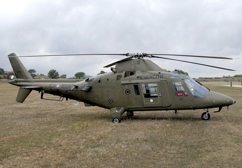 Military Helicopter on Field — Green, Overcast