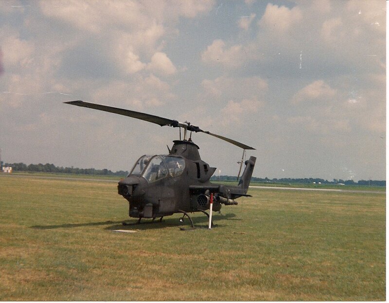 Military Helicopter on Field — Green