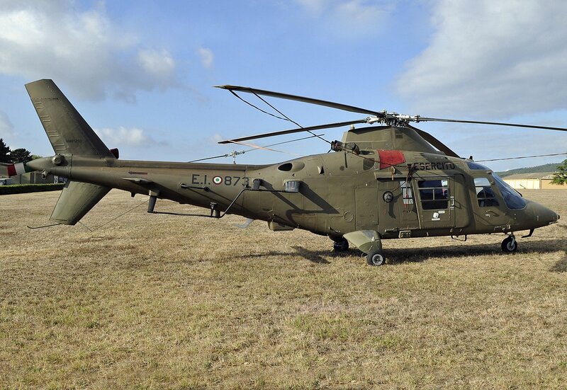 Military Helicopter on Field — Olive Green
