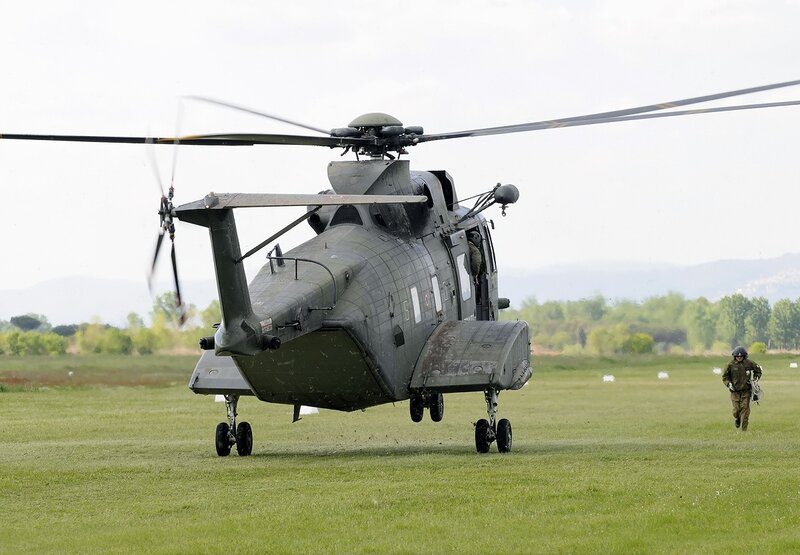 Military Helicopter on Grass — Green, Calm, Afternoon, Photograph, Soldier
