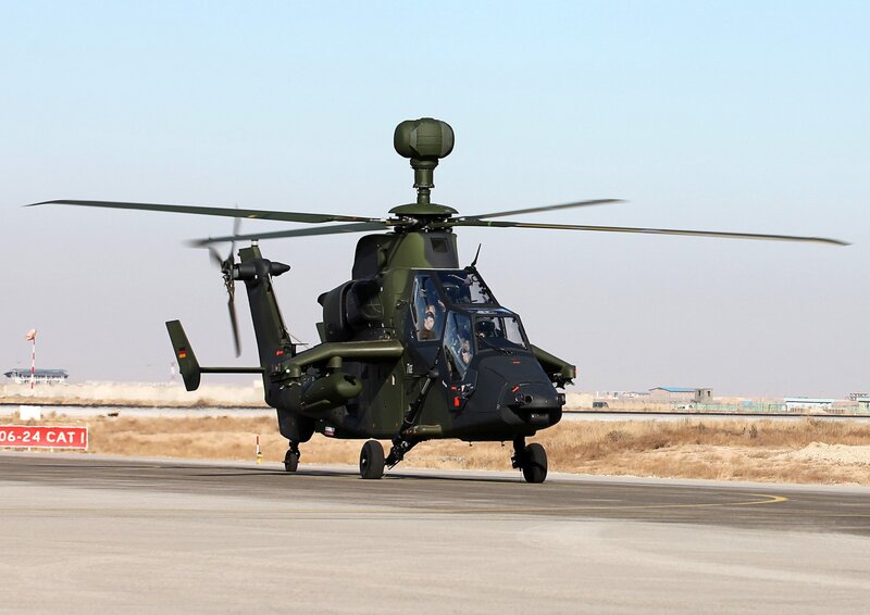 Military helicopter on runway