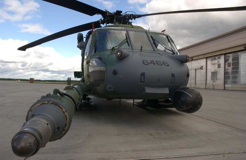 military helicopter on tarmac