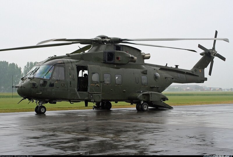 military helicopter on tarmac