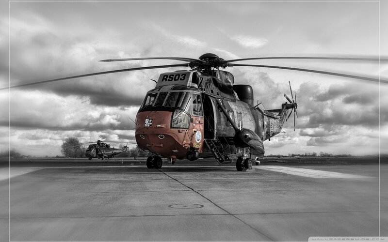 Military Helicopter on Tarmac — Black, Dramatic, Photograph