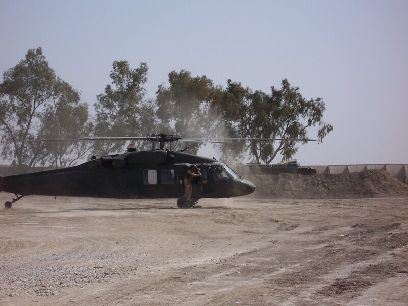 Military Helicopter on Tarmac — Brown