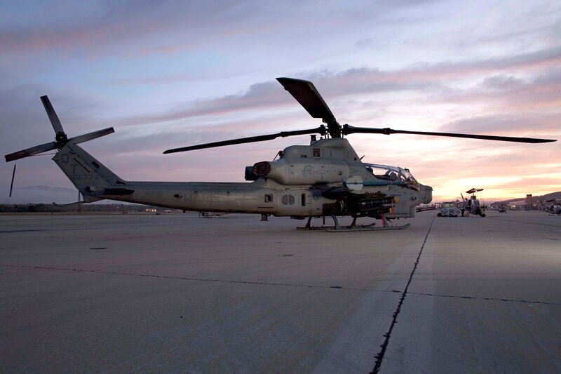 Military Helicopter on Tarmac — Gray, Dramatic, Sunset