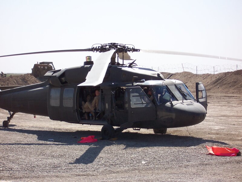 Military Helicopter on Tarmac — Gray