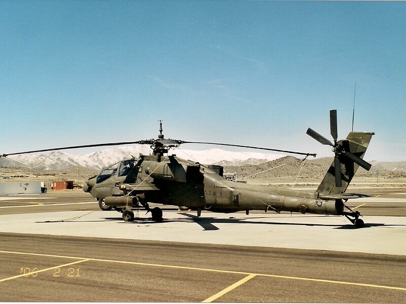 Military Helicopter on Tarmac — Green, Clear