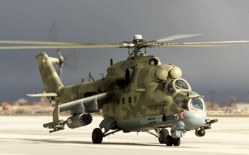 Military Helicopter on Tarmac — Green, Dramatic, Photograph, Rotor Blades