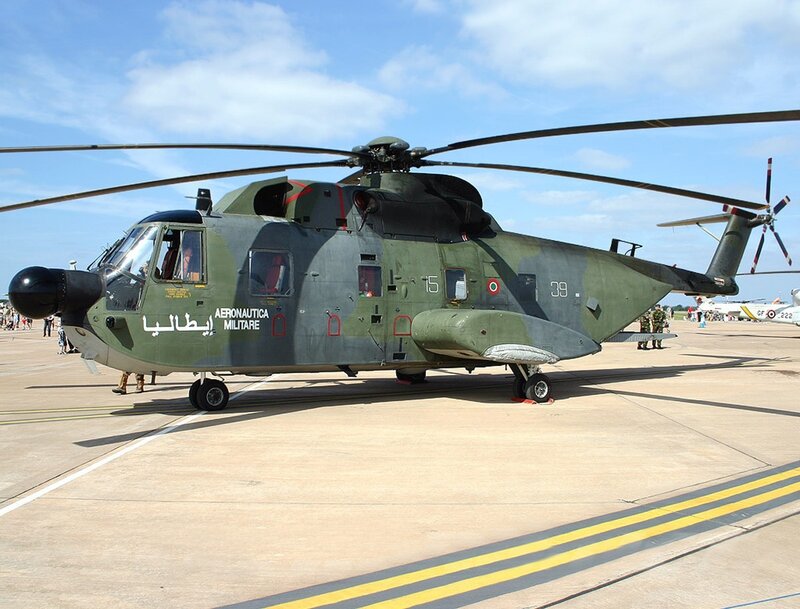 Military Helicopter on Tarmac — Green, Neutral, Afternoon, Photograph, Aircraft, People, Runway
