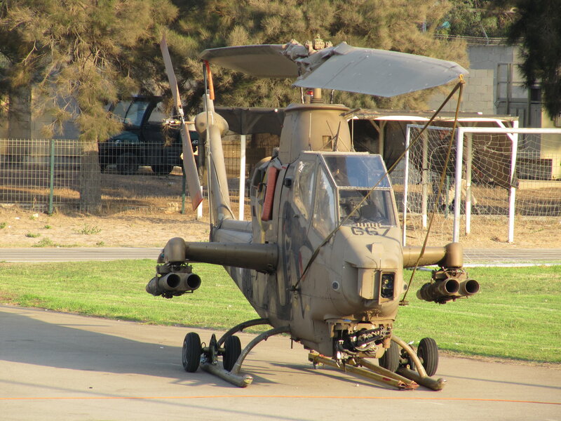 Military Helicopter on Tarmac — Green