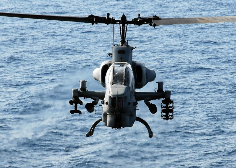 Military helicopter over ocean