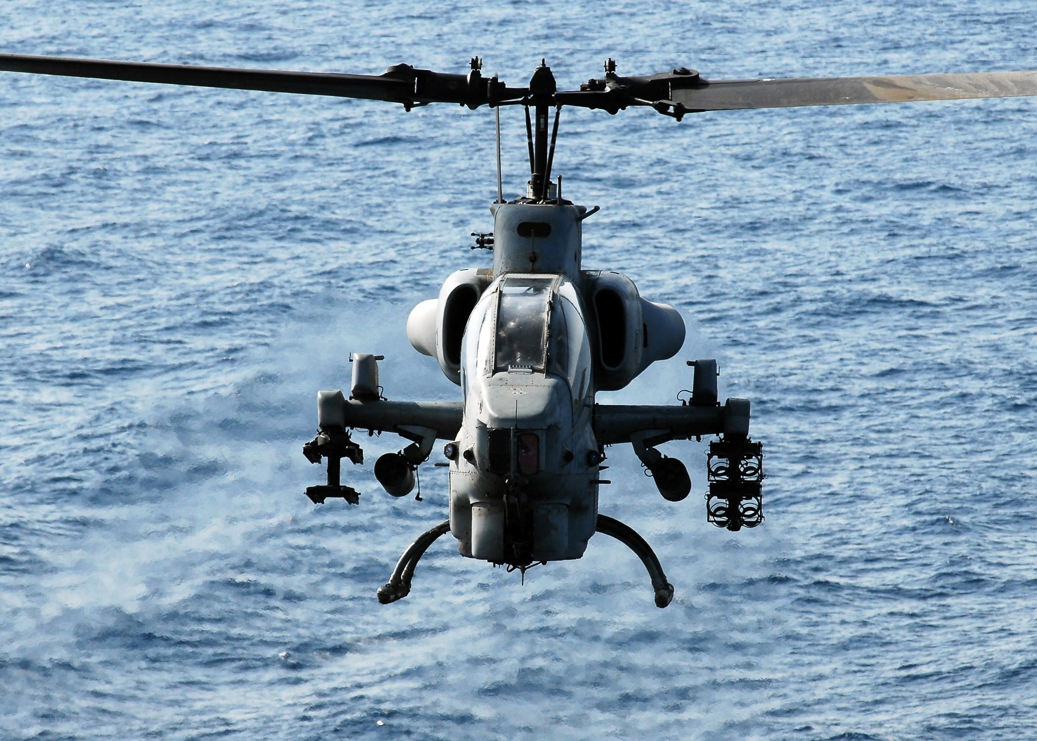 Military helicopter over ocean