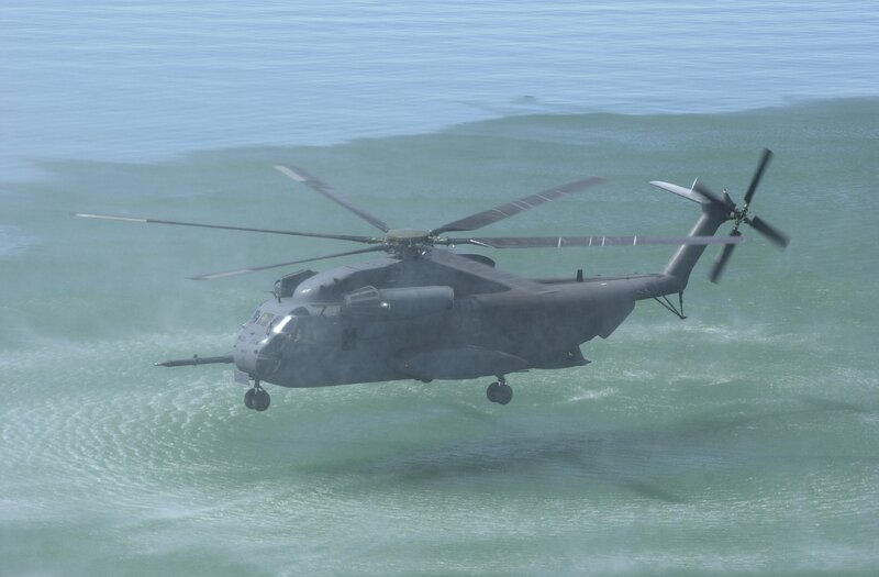 Military helicopter over ocean